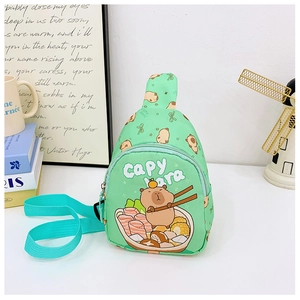 Detail of mint green mini chest bag featuring cartoon capybara print and adjustable strap