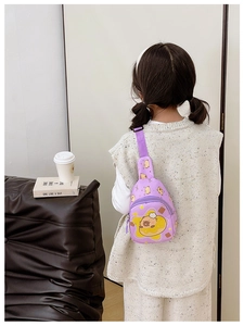 Detail of purple cartoon chest bag for kids with adjustable strap and cute prints