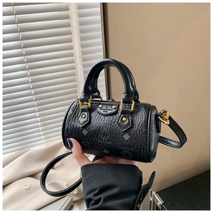 Detail of mini black bear print boston bag with gold zippers and detachable strap