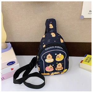 Detail view of cartoon Capybara print on navy blue canvas crossbody bag with metal zipper