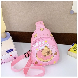 Close-up of pink Capybara crossbody bag with cute cartoon donut print for kids