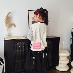 Pink minimalist mini square crossbody bag for kids with gold chain and ball charm