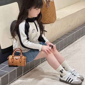 Kids contrast knit sweater with mini bear print cylinder handbag and denim skirt