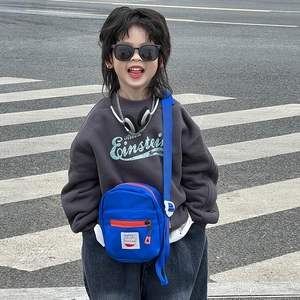 Kids blue canvas crossbody bag with orange zipper and grey Einstein sweatshirt