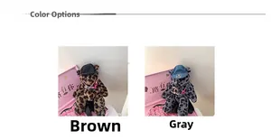 Detail view of leopard print teddy bear plush bag with denim hat and chunky chain