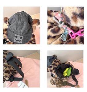 Detail shots of leopard plush bear backpack with smiley face cap and pink chain accessories