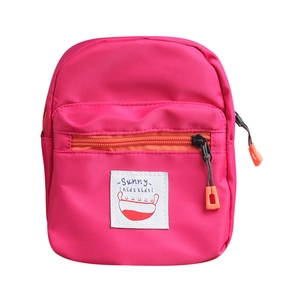 Rose red mini crossbody bag for kids with Sunny Kids logo and orange zipper details