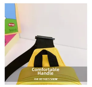Detail showing the comfortable top handle and durable nylon strap of the yellow kids chest bag