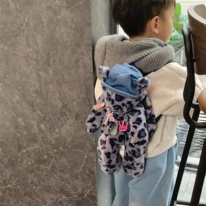 Toddler plush leopard print bear backpack in purple with a blue denim hat accessory