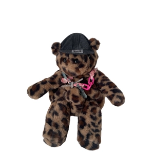 Cute leopard print plush bear backpack with black denim hat and decorative necklaces