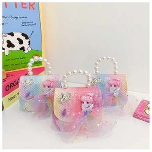 Detailed close-up of sequined girls bags with pearl handles and 3D mesh dresses
