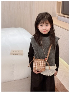 Brown plaid bucket bag for children with drawstring and adjustable shoulder strap