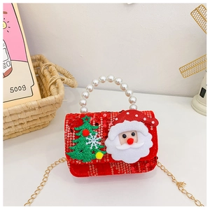 Detail of red sequined kids' Christmas bag with Santa decor and pearl handle