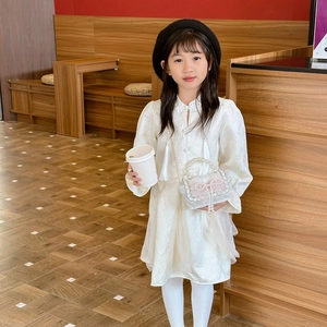 Elegant white floral dress for girls with pearl bow handbag and black beret in cafe