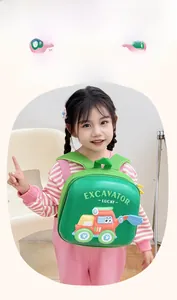 Detailed view of kids green EVA backpack with 3D cartoon excavator and logo