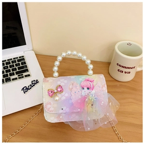 Detail of pearlescent girls' handbag with mesh skirt design and pearl handle