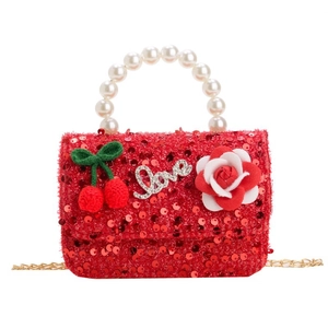 Red sequin children handbag with pearl handle, knit cherries, and gold chain strap