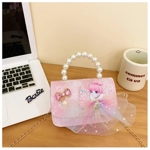 Detail of pink plaid girls' handbag with pearl handle, mesh tutu, and golden chain strap