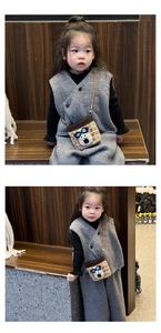 Detailed view of kids crochet dog crossbody bag with neutral knit vest and pant set