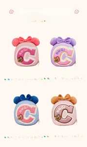 Detail view of hard shell kids backpacks with cute bear and bow ears in four colors