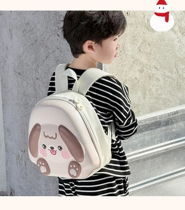 Detail showing the ergonomic breathable shoulder straps on the cute dog shell backpack