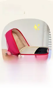 Detail view of the spacious inner storage and mesh pocket of the house-shaped kids backpack