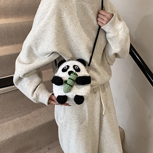 Cute crochet panda crossbody bag with bamboo charm and metal clasp for women