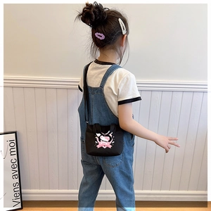 Kids black canvas crossbody bag featuring cute cartoon cat print and slim strap