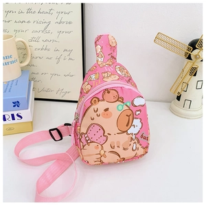 Close-up of pink waterproof nylon kids chest bag featuring a cute cartoon animal print