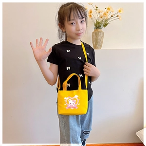 Toddler cartoon bear handbag in bright yellow canvas featuring an adjustable shoulder strap