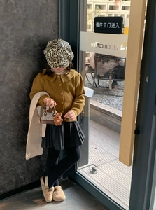 Girl's leopard print beret and yellow cardigan outfit styled with a plaid handbag