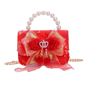 Red sequin girls handbag with pearl handle and sheer bow for a royal princess look