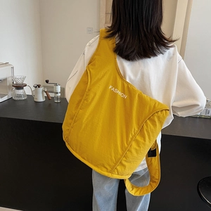 Minimalist yellow large capacity shoulder bag with wide strap and fashion lettering logo