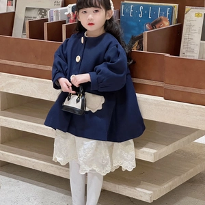 Girl's elegant navy blue wool coat with balloon sleeves and white lace dress