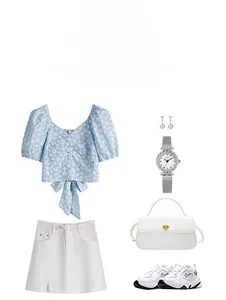 Fashion layout featuring a silver watch with colorful crystal markers and floral top