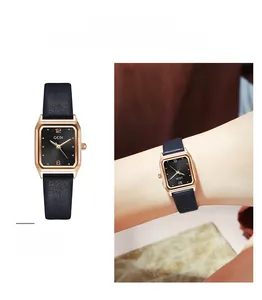 Detail shot of a women square quartz watch with black leather strap and rose gold case