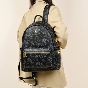 Sac à dos chic en similicuir noir avec imprimé ours et détails de rivets dorés élégants