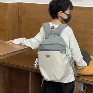 Kids color-block backpack in light grey with star charm for school and travel