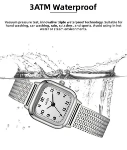 Detail of square silver watch with mesh band showing 3ATM water resistance splashes
