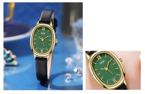 Macro view of GEDI oval watch with green dial, gold casing and black leather strap
