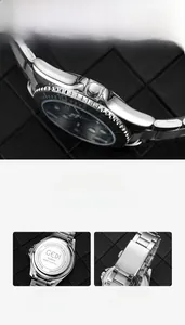 Detail view of the polished silver stainless steel case back and alloy fold-over clasp