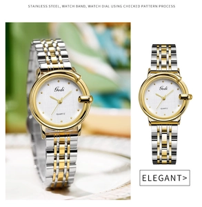 Detail view of Gedi quartz watch showing textured white dial and two-tone steel band