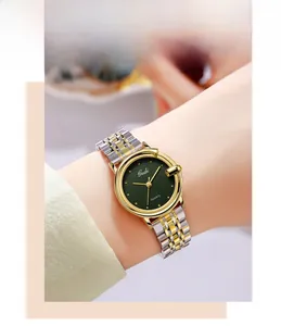 Close-up of Gedi women quartz watch with green dial and silver-gold steel bracelet