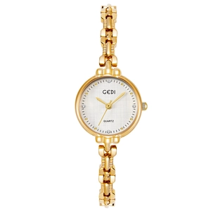 Orologio da donna dorato con cinturino a maglia, quadrante bianco e indici in strass