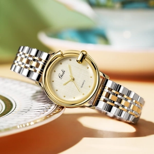 Gedi luxury women's quartz watch with gold-silver steel band and champagne textured dial