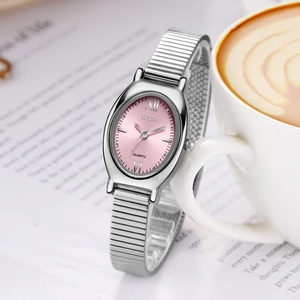 Vintage Quarz Uhr Damen Ovales Legierungsgehäuse Metall Dehnband Wasserdicht Retro Elegant Mode Armbanduhr