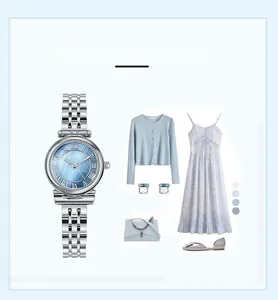 Close-up of women's quartz watch with blue Roman dial and silver metal strap matching outfit