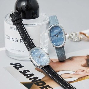 Elegant oval quartz watch with mother of pearl dial and slim lychee leather strap