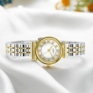 Elegant retro quartz watch with Roman numerals and mother-of-pearl dial on white silk