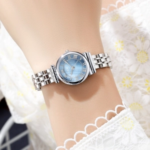 Detail of GEDI lady quartz watch with light blue mother of pearl dial and silver steel band
